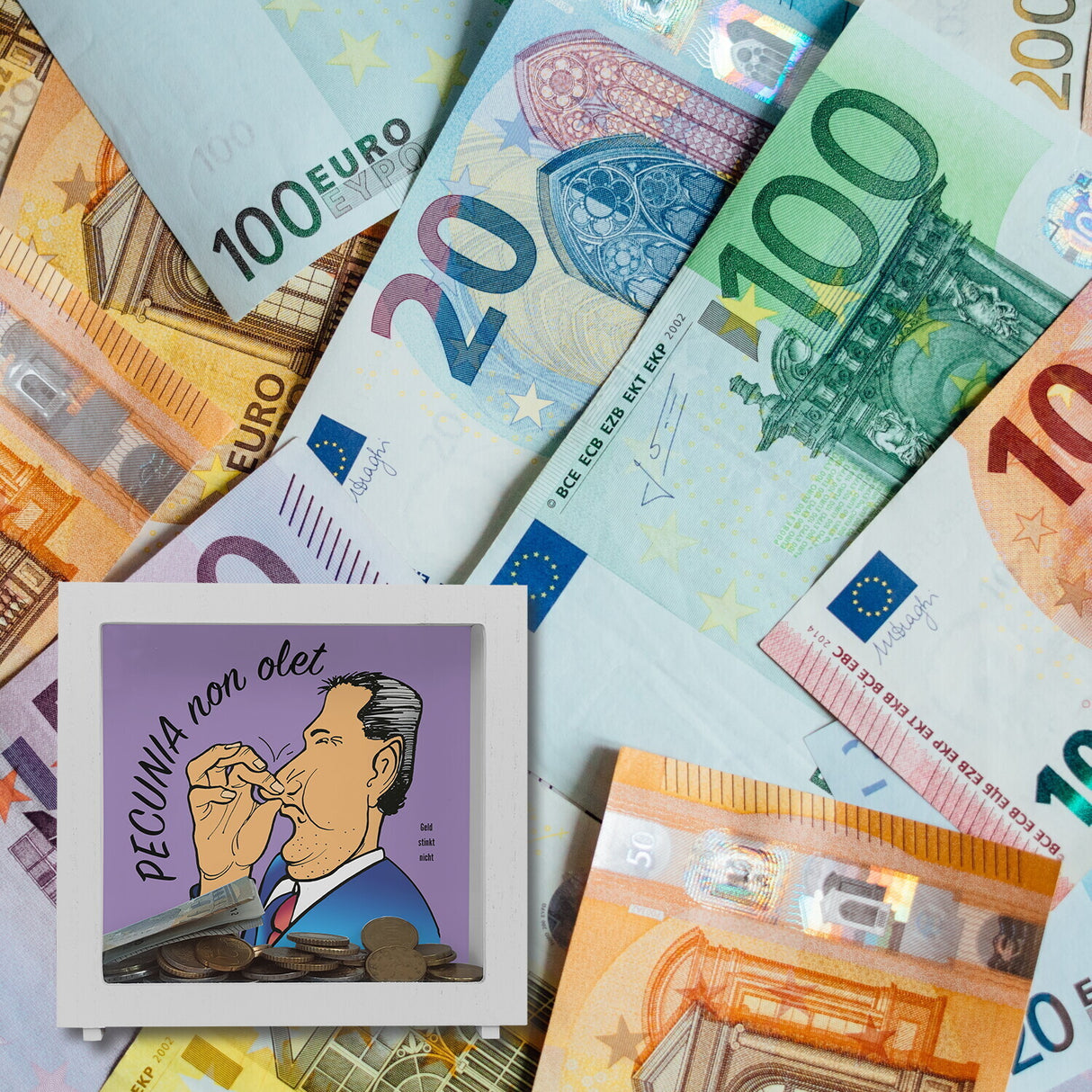 Pecunia non olet Spardose in Lila zum Thema Geld