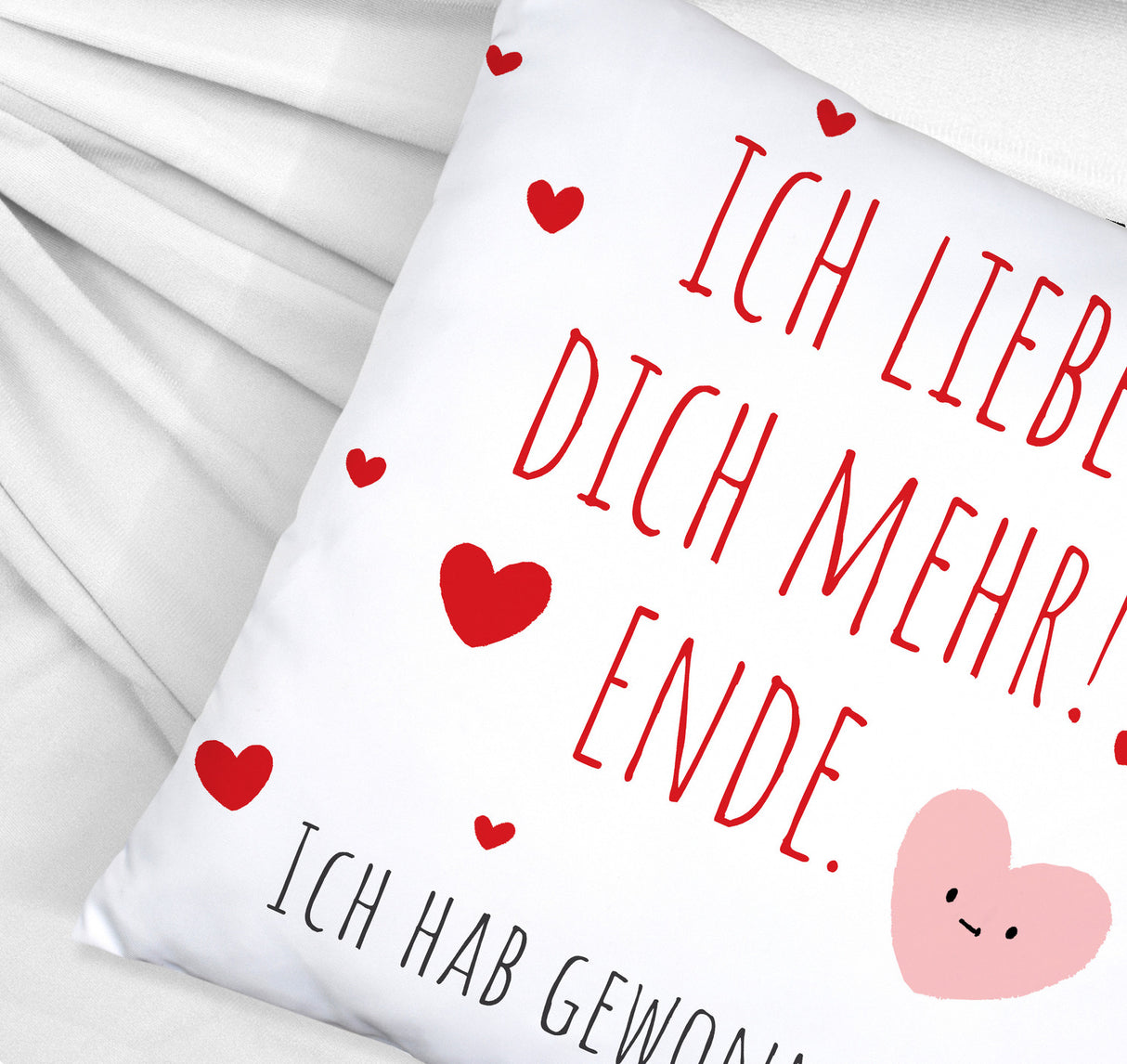 Herzen Kissen mit Spruch Ich liebe dich mehr! Ende.