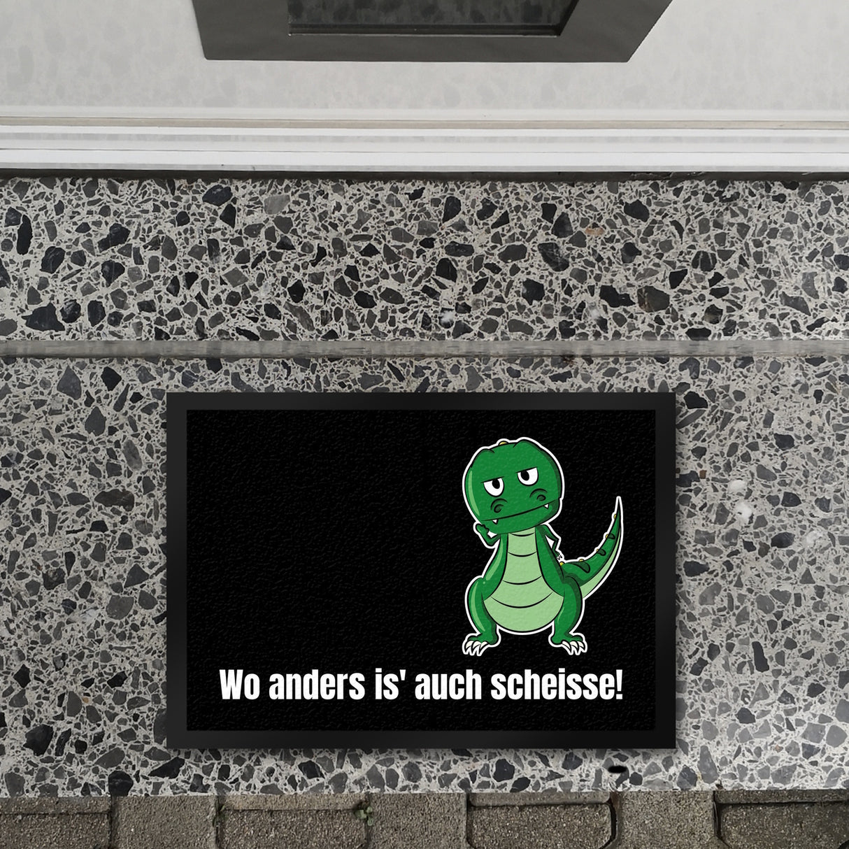 T-Rex Fußmatte in 35x50 cm mit Spruch Wo anders ist es auch scheisse!
