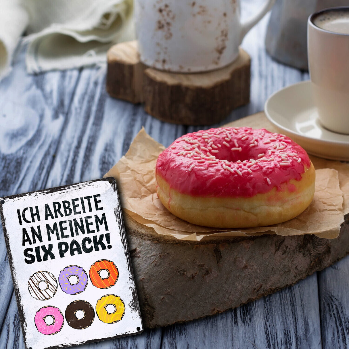 Ich arbeite an meinem Six Pack Metallschild mit leckeren Donuts