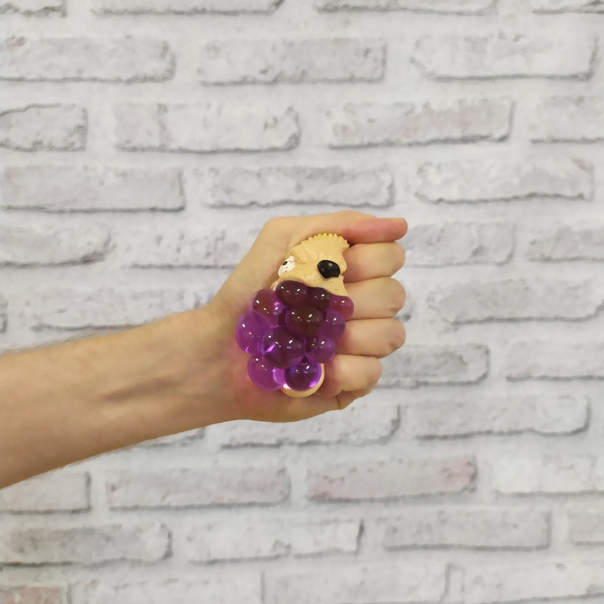 Horrorfratze Stressball mit Netzball in lila