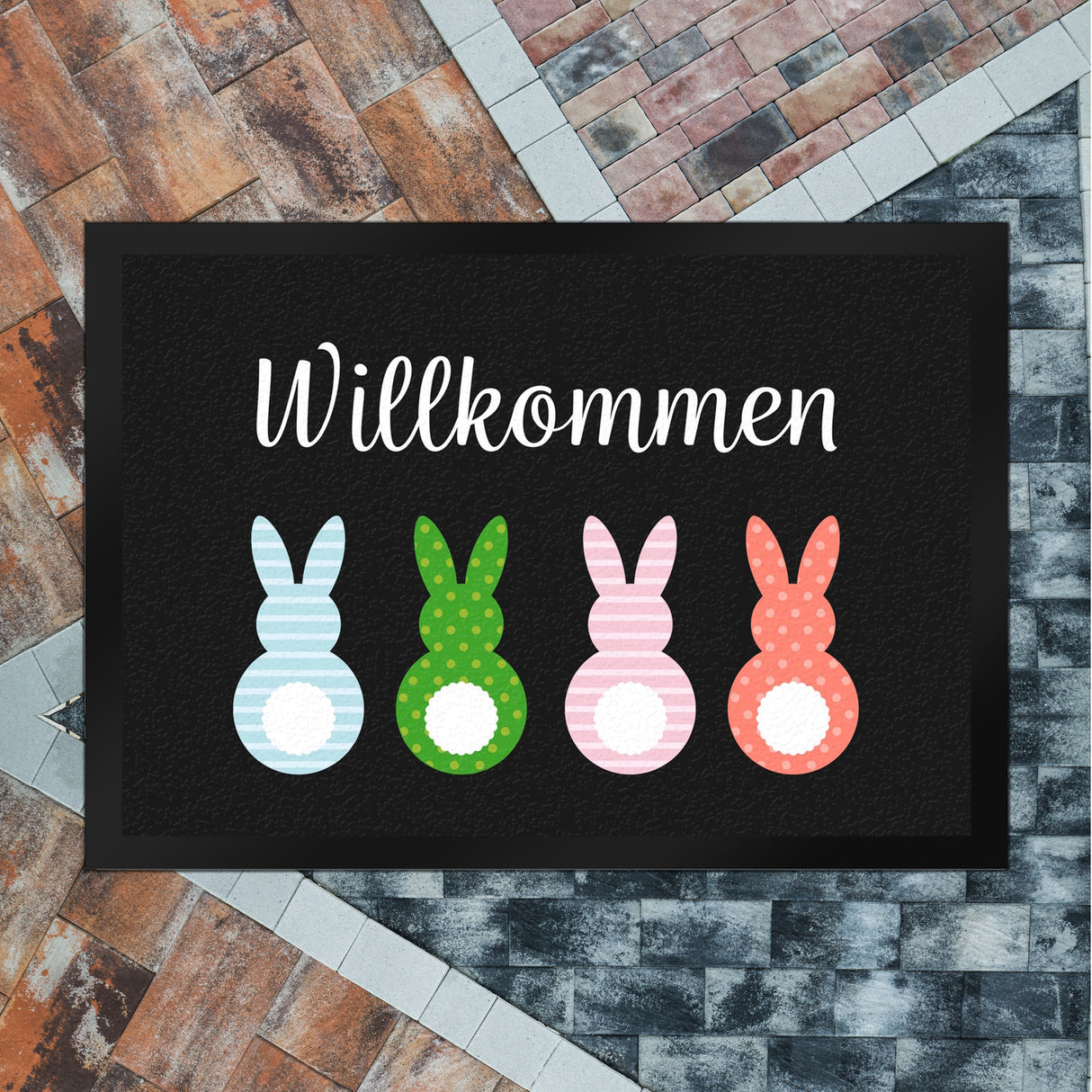 Willkommen Fußmatte mit vier bunten Hasen