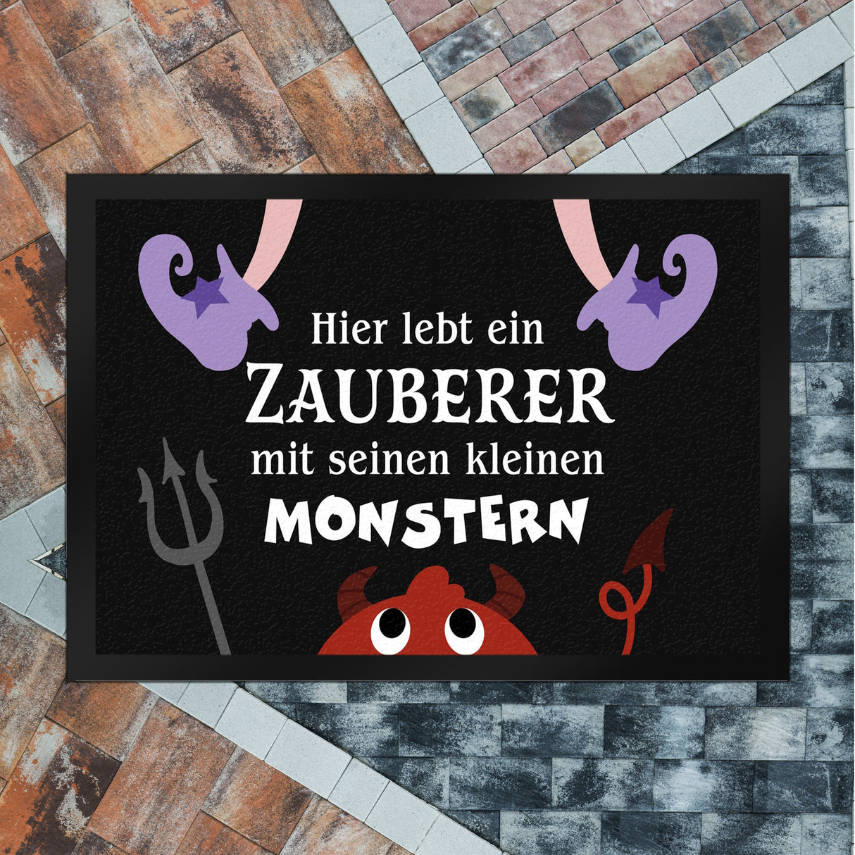 Monster Fußmatte in 35x50 cm mit Spruch Hier lebt ein Zauberer