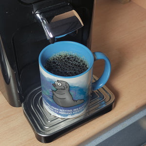 Kaffeebecher mit Seehund Motiv und Spruch: Ich will einen Seehund, der klatscht, ...