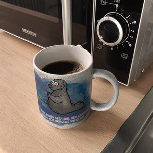 Kaffeebecher mit Seehund Motiv und Spruch: Ich will einen Seehund, der klatscht, ...