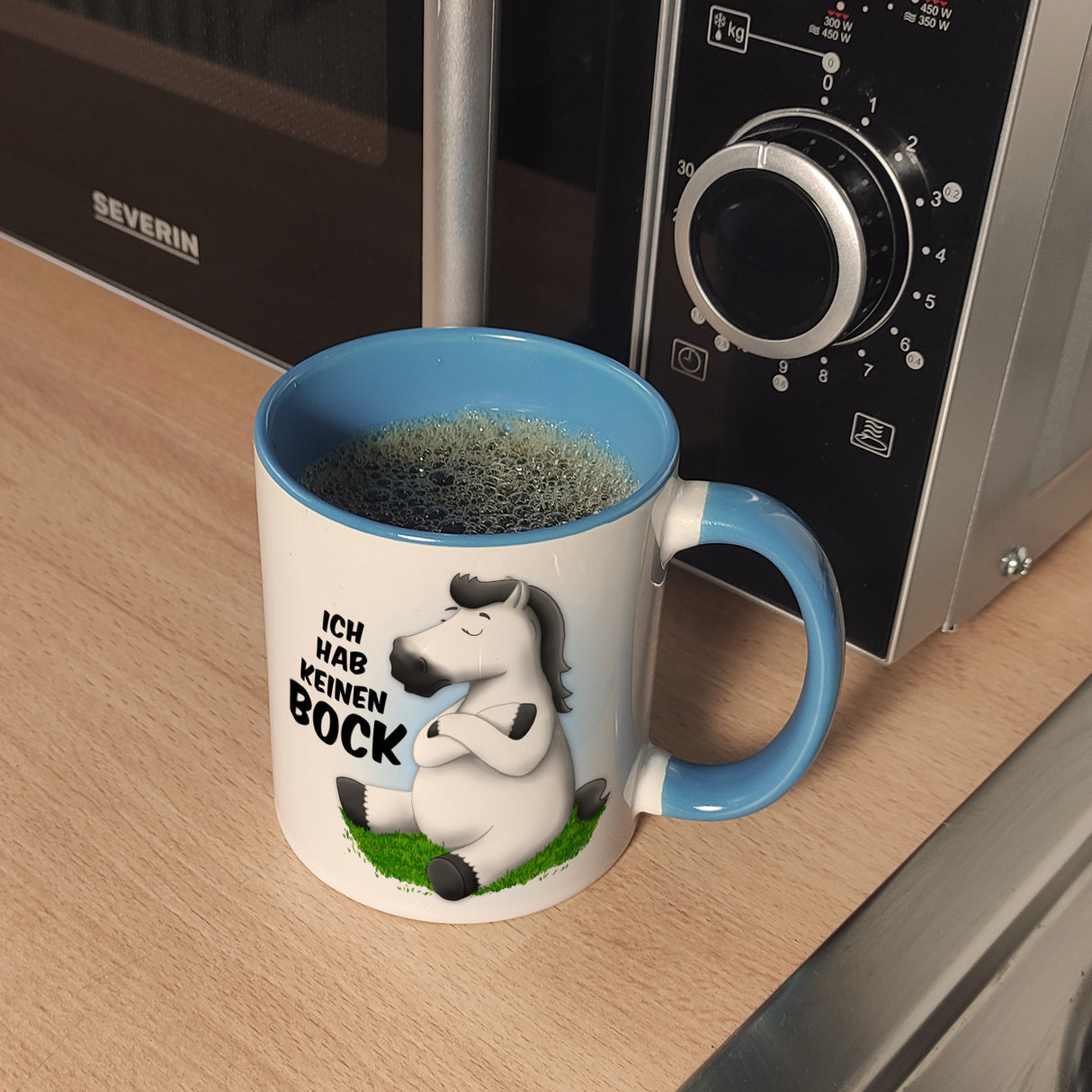 Kaffeebecher mit weißes Pferd Motiv und Spruch: Ich hab keinen Bock
