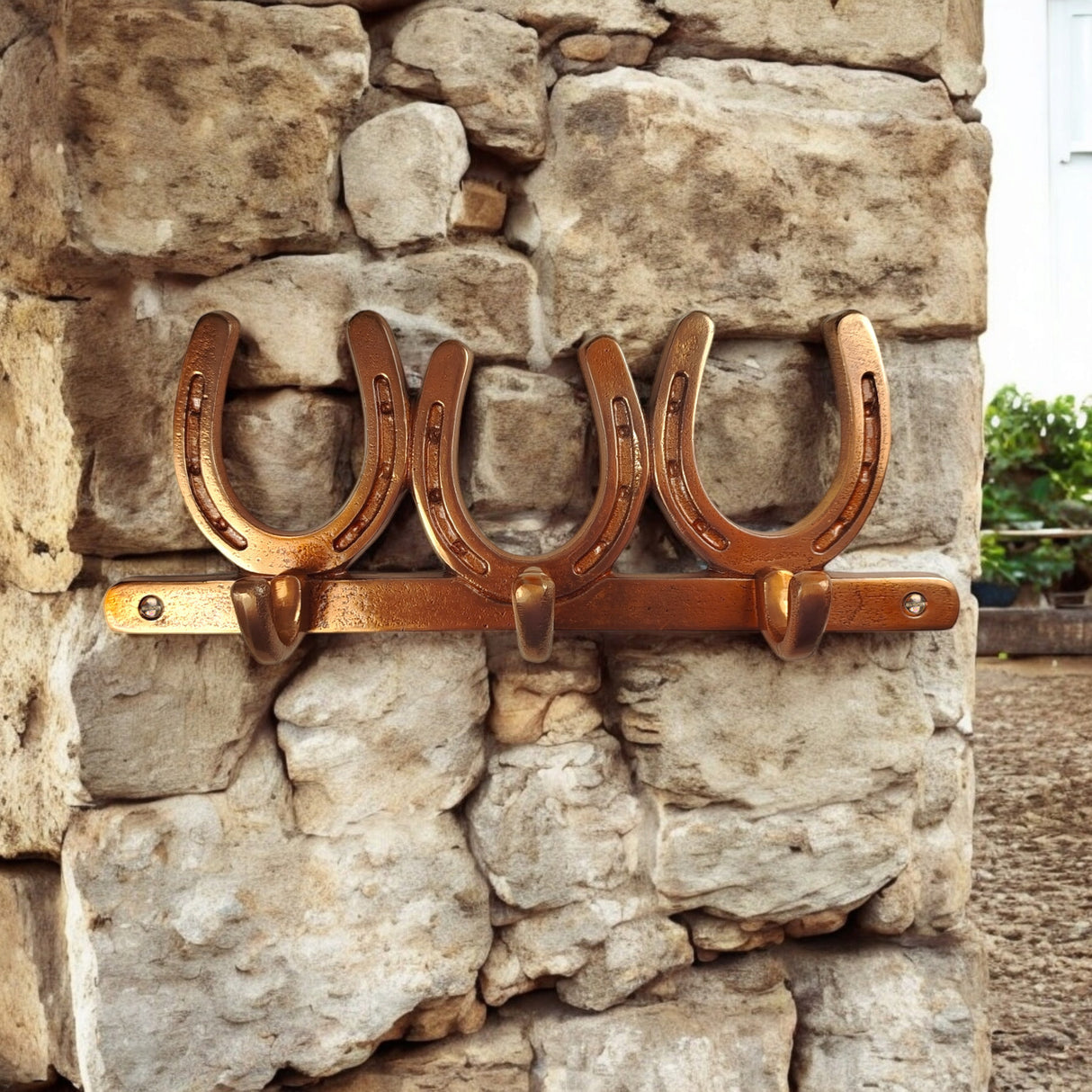 Drei Hufeisen Wandhaken in Bronzeoptik - Pferde Garderobenleiste aus Metall