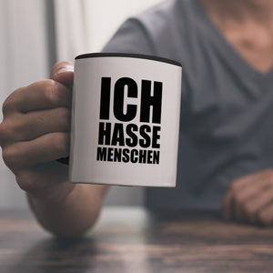 Kaffeebecher mit Mittelfinger Motiv und Spruch: Ich hasse Menschen