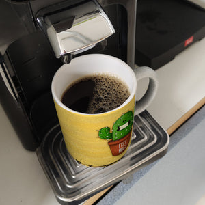 Kaffeebecher mit freundlicher Kaktus Motiv und Spruch: Free Hugs