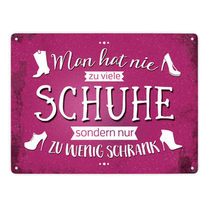 Metallschild mit Spruch: Man hat nie zu viele Schuhe, ...