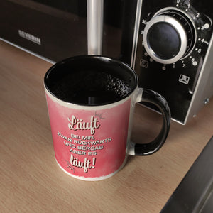 Kaffeebecher mit Spruch: Läuft bei mir. Zwar rückwärts ...