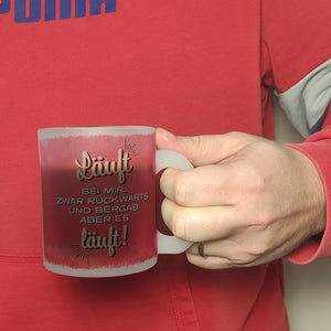 Kaffeebecher mit Spruch: Läuft bei mir. Zwar rückwärts ...