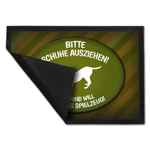 Schuhe ausziehen, der Hund will neues Spielzeug Fußmatte - spielen Wohnung Schuh Hunde Haushalt Füße