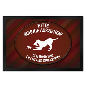Schuhe ausziehen, der Hund will neues Spielzeug Fußmatte - spielen Wohnung Schuh Hunde Haushalt Füße