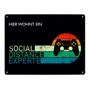 Hier wohnt ein Social Distance Experte Metallschild mit Gamer-Motiv