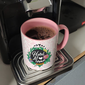 Hotel Mama Tasse mit floralen Mustern und Aufschriften