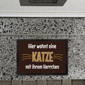 Fußmatte Hier wohnt eine Katze mit ihrem Personal