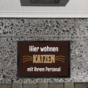 Fußmatte Hier wohnt eine Katze mit ihrem Personal