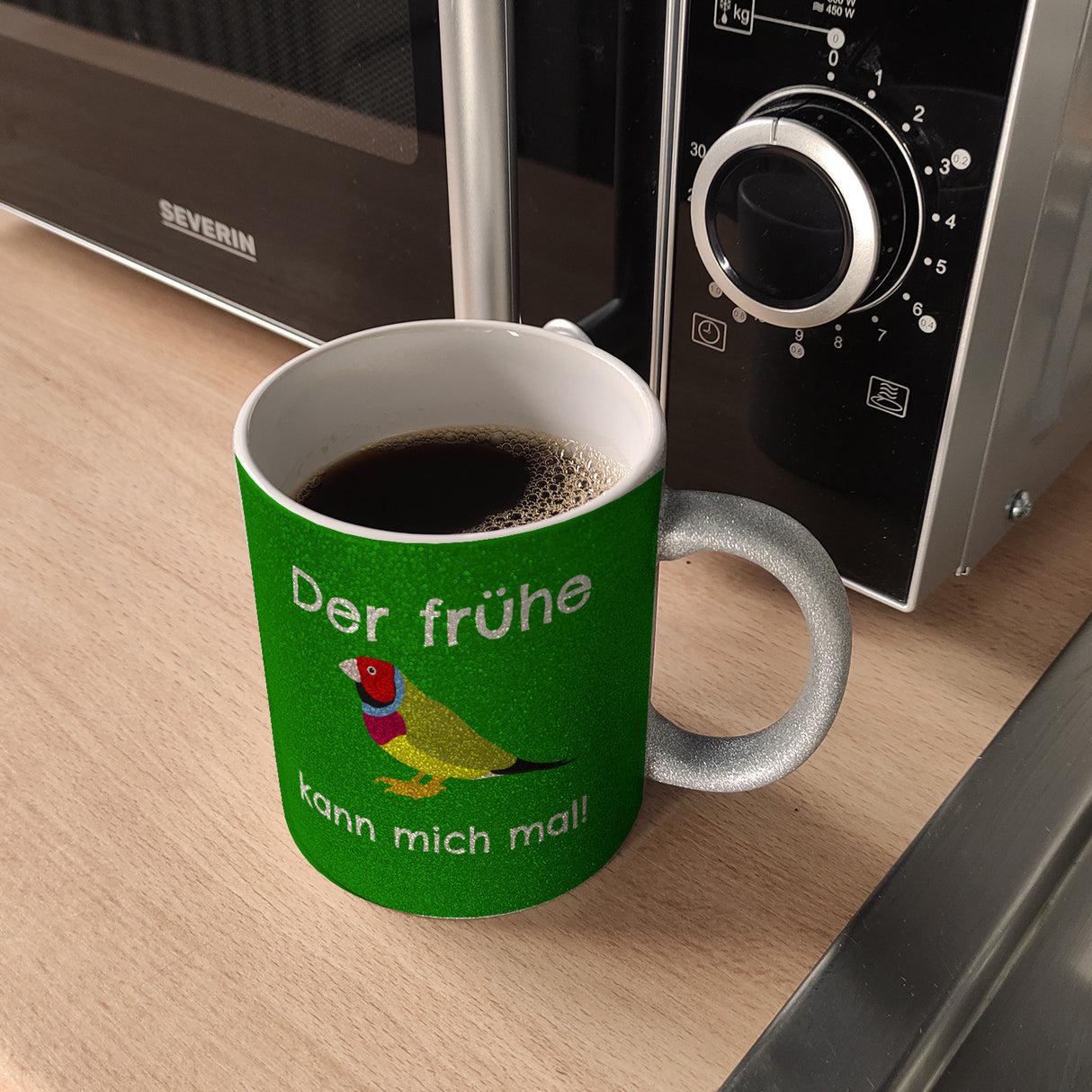 Kaffeebecher mit Bild und Spruch Der frühe Vogel kann mich mal!