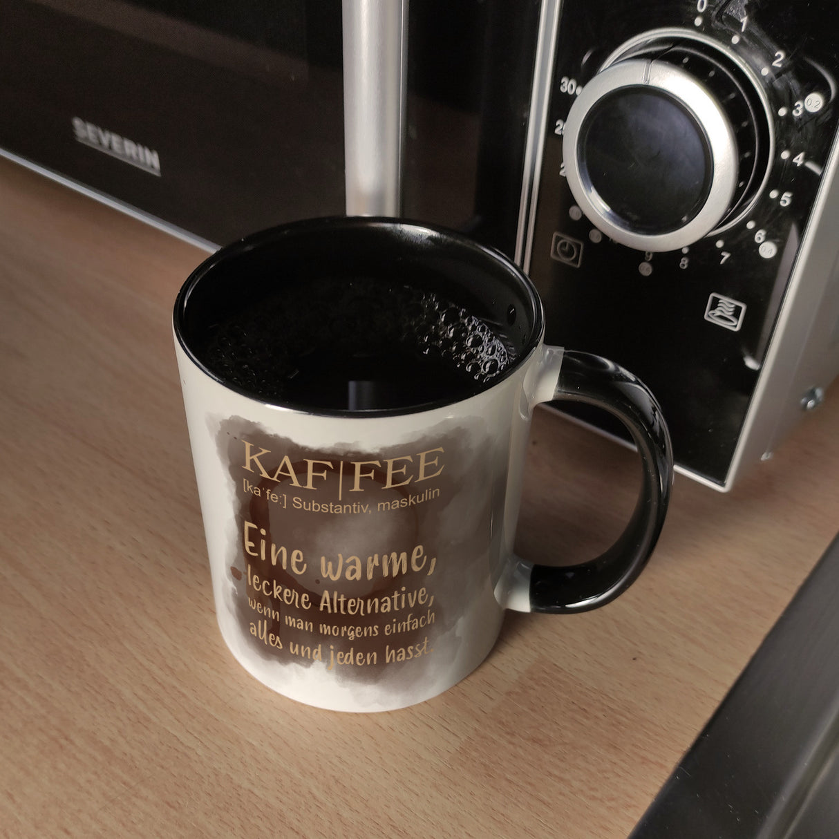 Kaffee - Kaffeebecher mit Wortdefinition
