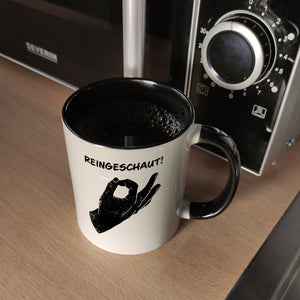 Reingeschaut! Kaffeebecher mit lustigem Streich