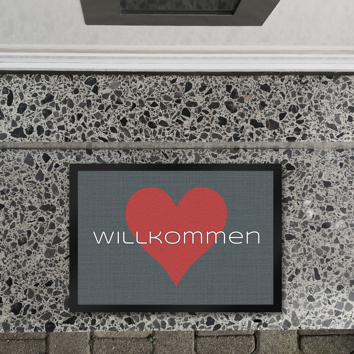Fußmatte in 35x50 cm in dunkelgrau mit Spruch und Symbol Home und Herz