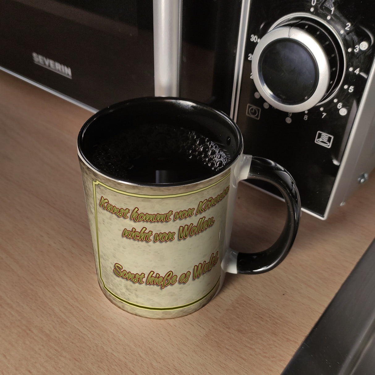 Kaffeebecher mit Motiv und Spruch - Kunst kommt von Können nicht von Wollen