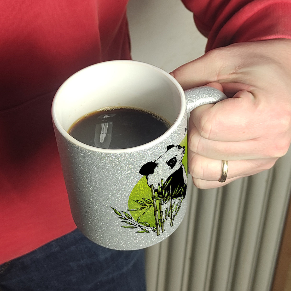 Panda mit Bambus Kaffeebecher und grün