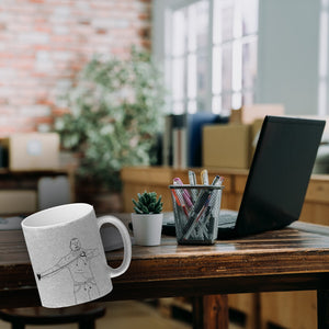 Kaffeebecher mit ironischem Spruch, gezeichnetem Charakter und Steinschleuder
