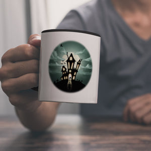Kaffeetasse mit gruseligem Geisterhaus Motiv und Spruch - Happy Halloween