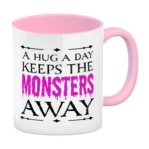 Kaffeetasse für Halloween mit Spruch - A hug a day keeps the monsters away