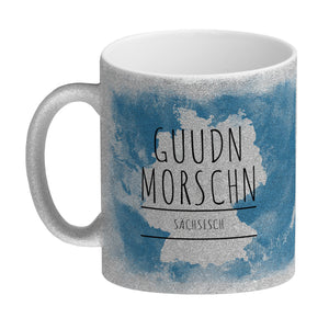 Hallo auf Sächsisch Guudn Morschen lustiger Kaffeebecher mit blauem Hintergrund