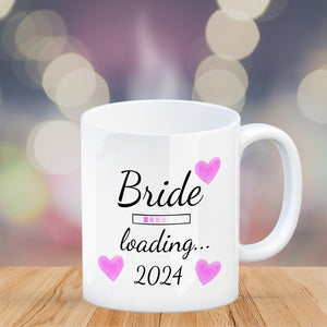 Bride loading Tasse Kaffeetasse 2022 mit rosa Herzen