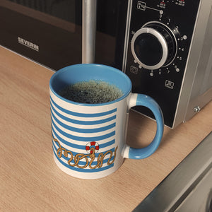 Kaffeebecher mit Moin-Schriftzug und Rettungsring