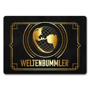 Weltenbummler Fußmatte mit goldenem Globus und Reisemotiv