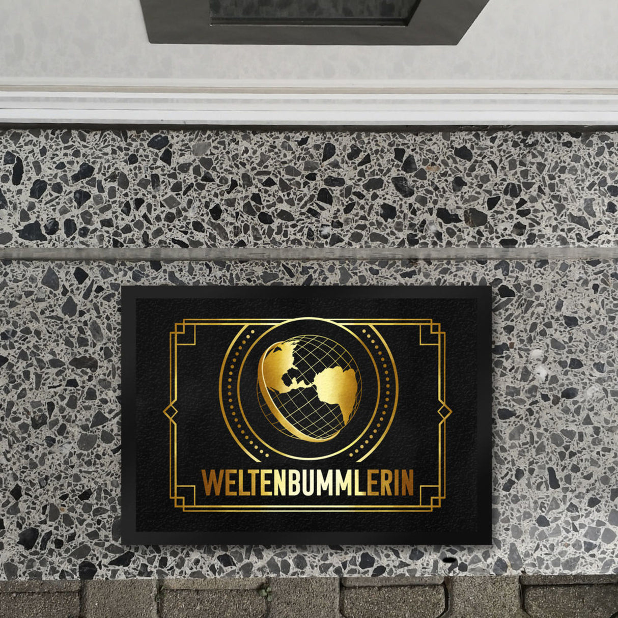 Weltenbummler Fußmatte mit goldenem Globus und Reisemotiv