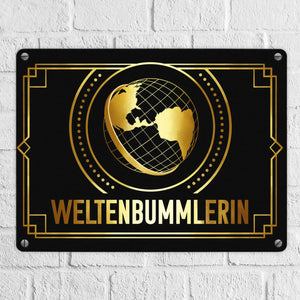 Weltenbummler Metallschild mit goldenem Globus und Reisemotiv
