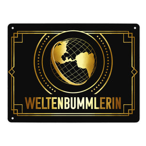 Weltenbummler Metallschild mit goldenem Globus und Reisemotiv