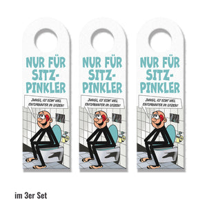Bitte im Sitzen pinkeln Türhänger im Comic-Stil schwarz