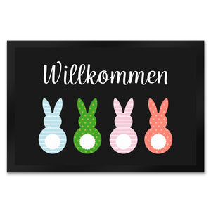 Willkommen Fußmatte mit vier bunten Hasen