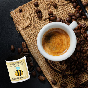 Optimismus heißt rückwärts Sumsi mit Po Biene Kaffeebecher mit Spruch