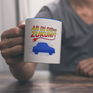 Ab in die Zukunft Elektroauto Kaffeetasse