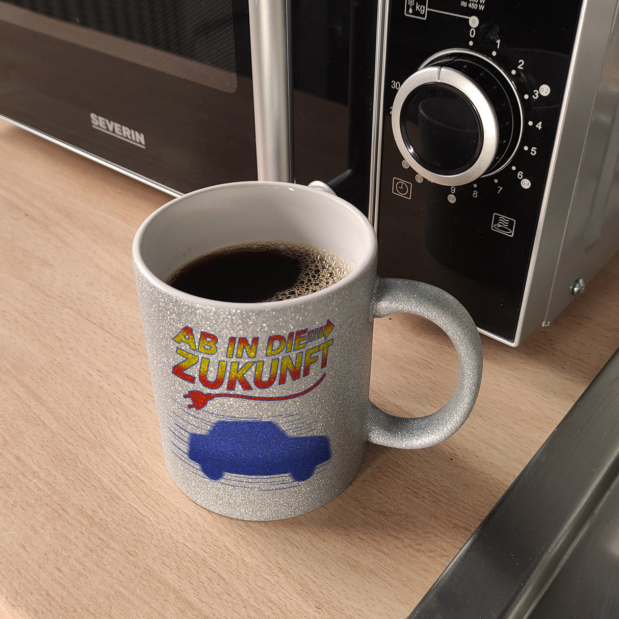Ab in die Zukunft Elektroauto Kaffeetasse