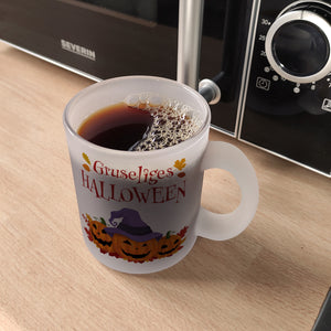 Gruseliges Halloween Kaffeebecher mit grinsenden Kürbissen