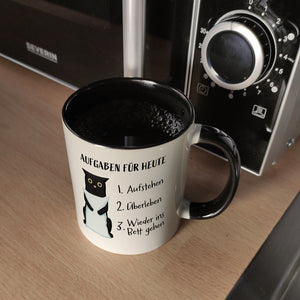 Aufgaben für heute Kaffeebecher mit müder Katze