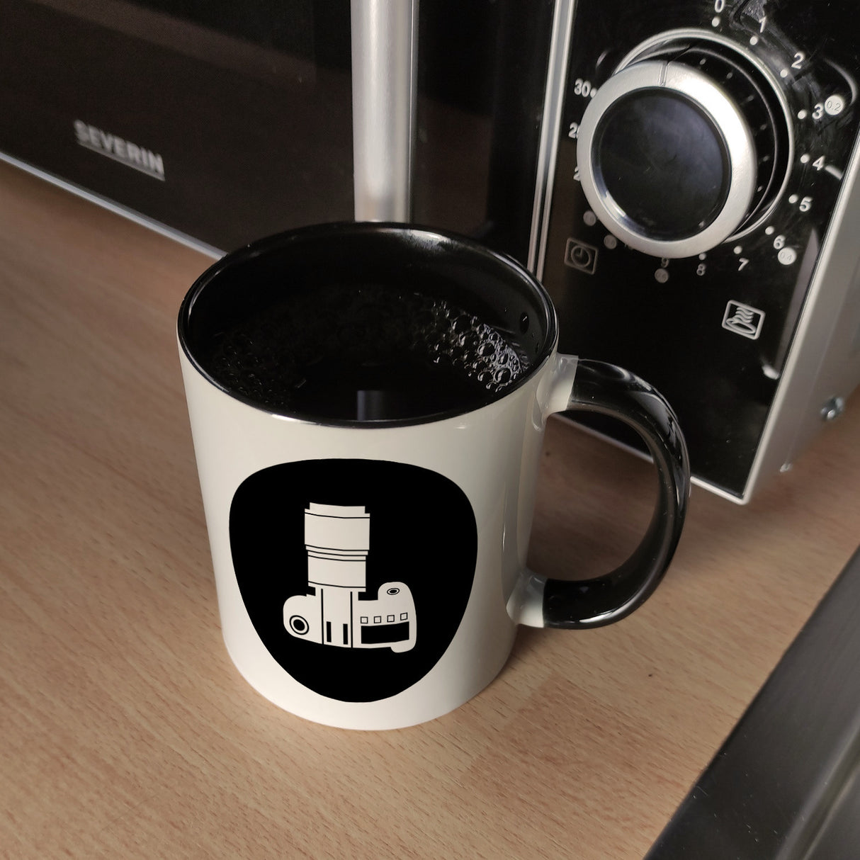 Fotografie Kaffeebecher mit Kamera Motiv