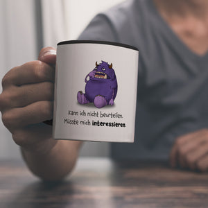 Freches Monster in lila Kaffeebecher mit lustigem Spruch