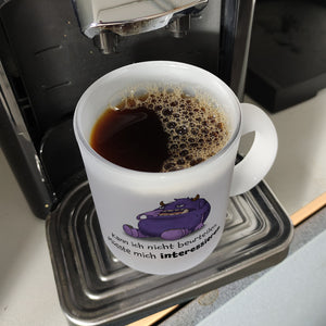 Freches Monster in lila Kaffeebecher mit lustigem Spruch