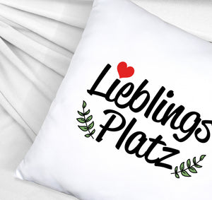 Lieblingsplatz Kissen mit rotem Herz und Blättern