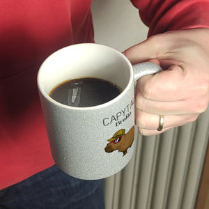 Capytal BraRa Kaffeebecher mit rappendem Capibara